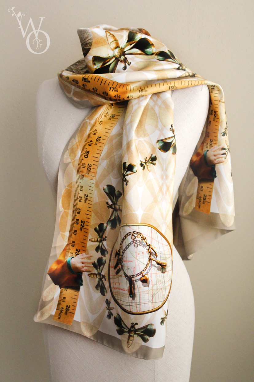 a scarf with a photorealistic print made with objects of a deceased loved one.
