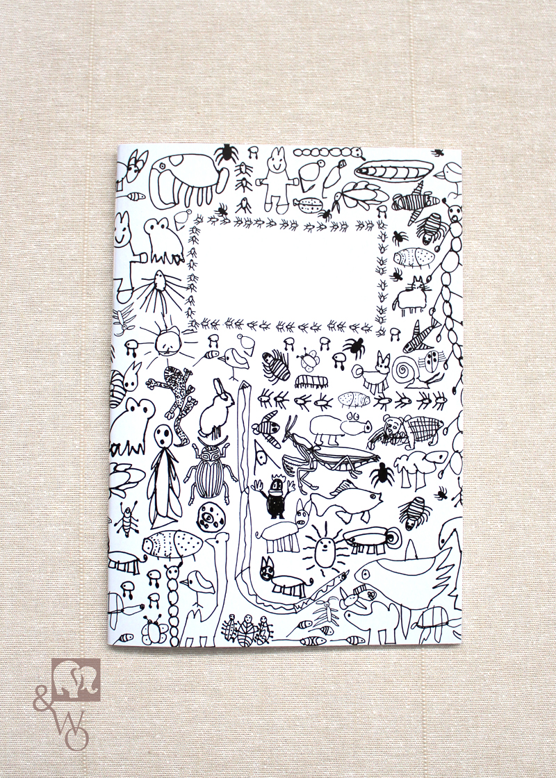 lined A6 notebook with black and white critter illustrations