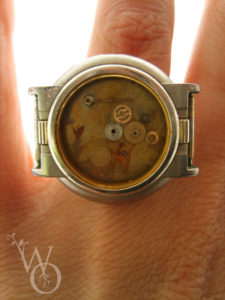 ring deep sea diver with various aged watch parts